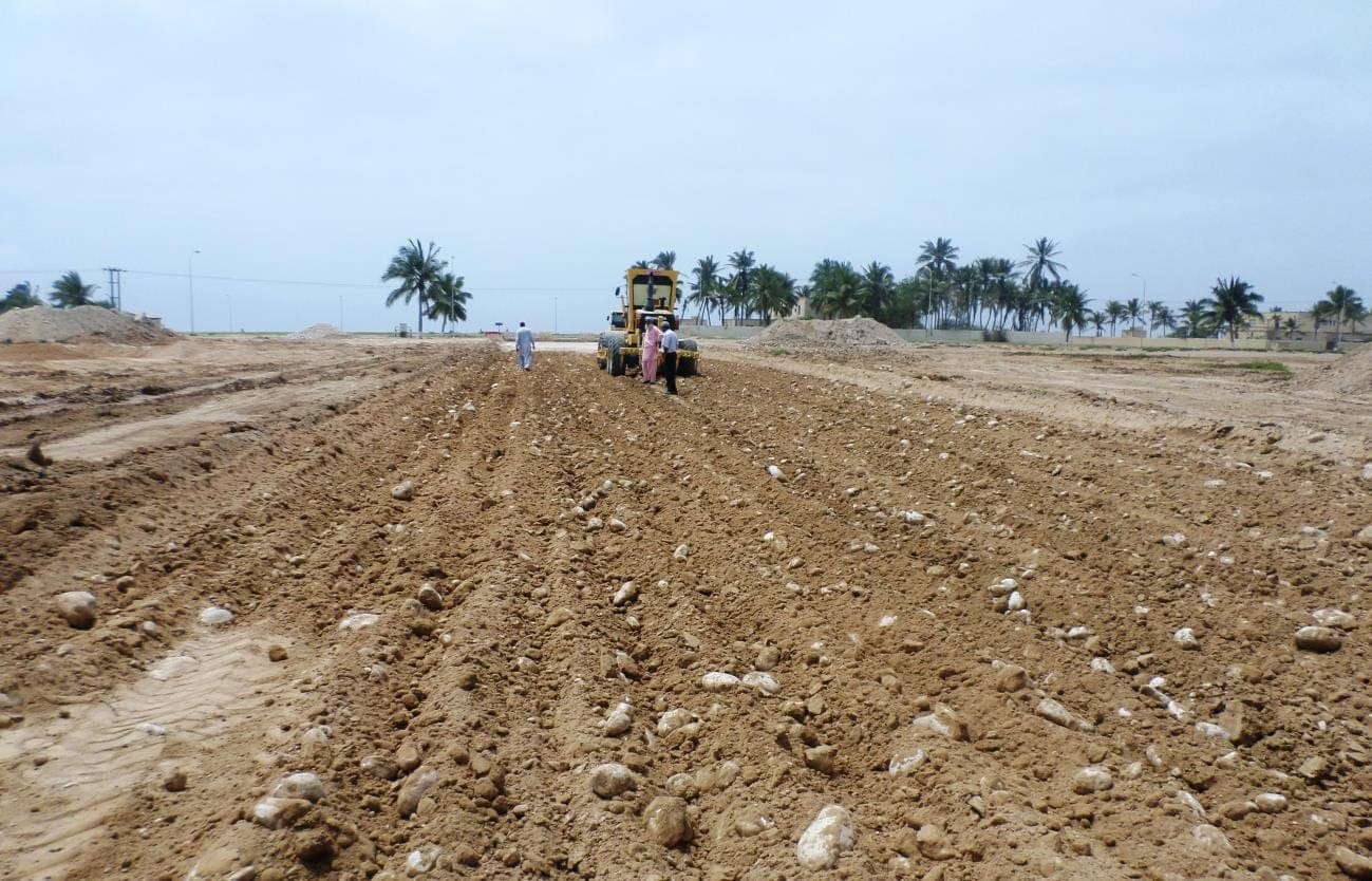 Earthworks along a straight road corridor