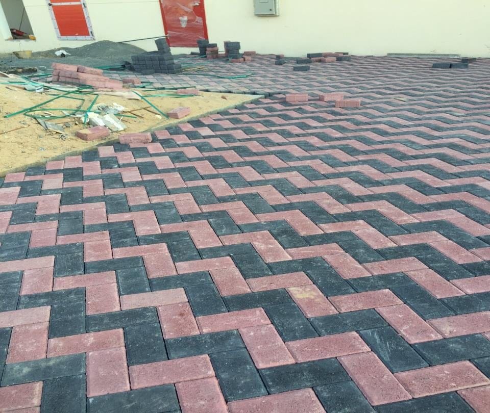 Chevron interlock paving with kerb