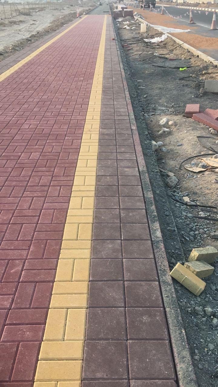 Footpath with yellow tactile edging