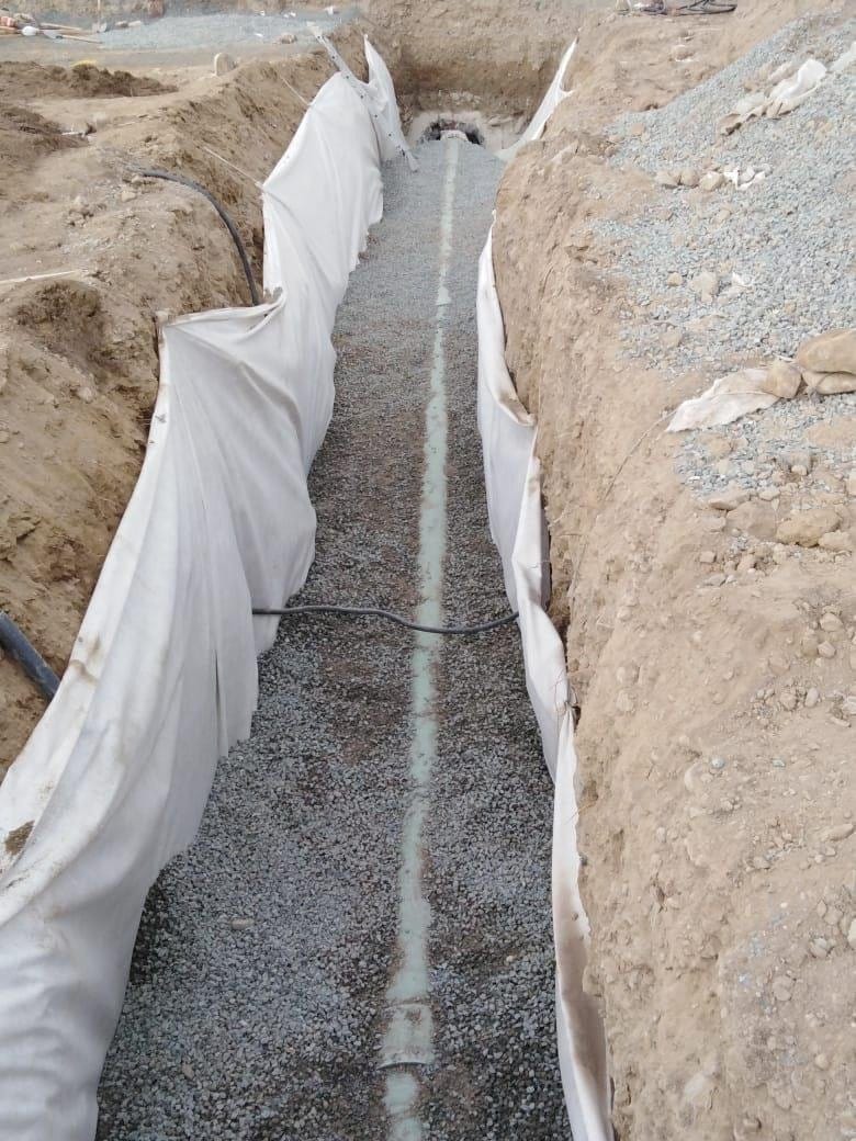 Concrete-lined drainage trench