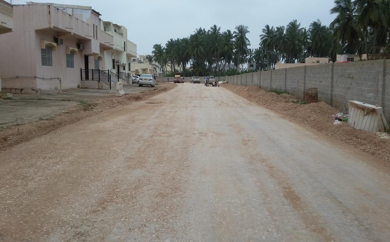 Graded road formation between houses