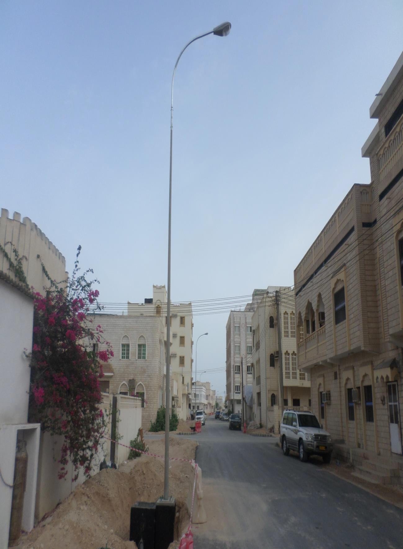 New street-light pole on a residential street
