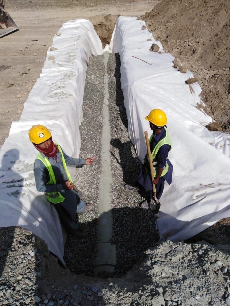Trench lined with white membrane
